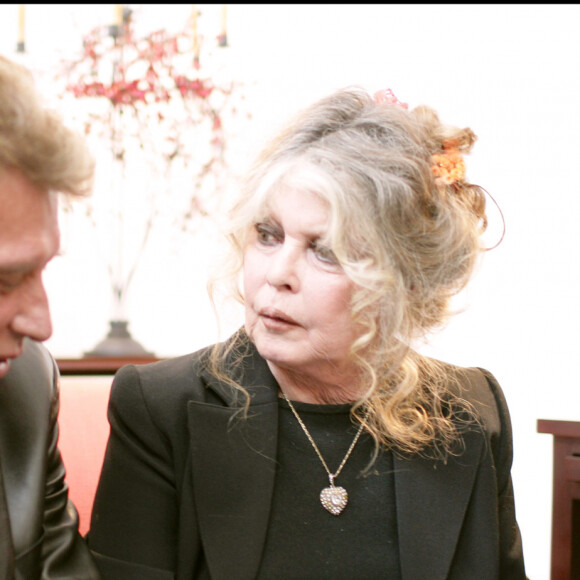 Brigitte Bardot et Johnny Hallyday au Noël des animaux SPA à Levallois-Perret en 2004