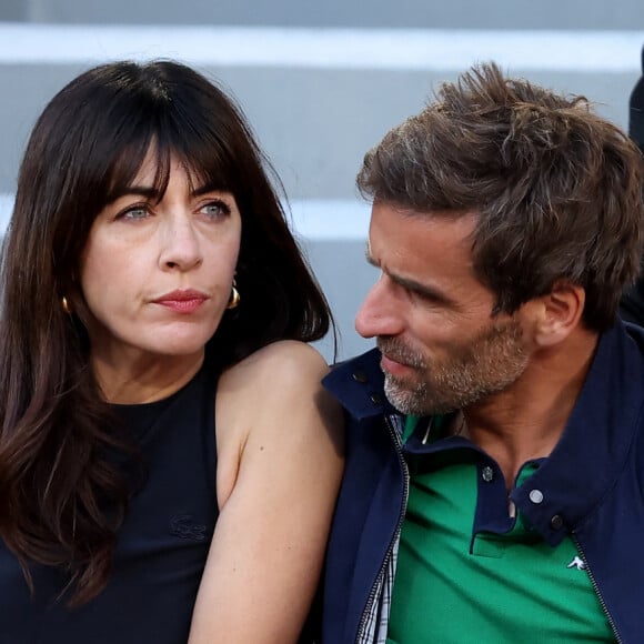 Nolwenn Leroy et son compagnon Arnaud Clément - Célébrités dans les tribunes des Internationaux de France de tennis de Roland Garros 2024 à Paris le 7 juin 2024. © Jacovides-Moreau/Bestimage 