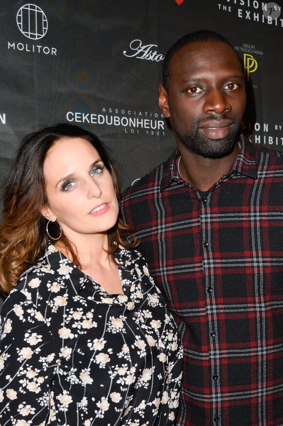 Omar Sy et sa femme Hélène au vernissage de l'exposition "Vision by AG", au profit de l'association caritative CeKeDuBonheur, à la Piscine Molitor à Paris, le 30 novembre 2016. © Guirec Coadic/Bestimage 