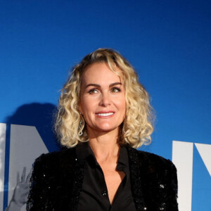 Laeticia Hallyday pendant le photocall du vernissage de l'exposition "Johnny Hallyday, l'exposition" au Palais des Expositions à Paris, le 21 décembre 2023