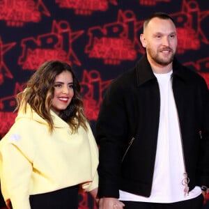 En janvier dernier, après des années d'amour, Inès Reg et Kevin Debonne ont annoncé leur divorce.
Inès Reg et son compagnon Kévin Debonne lors des NRJ Music Awards au Palais des Festivals de Cannes. © Dominique Jacovides/Bestimage