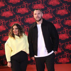 Inès Reg et son compagnon Kévin Debonne lors de la 23ème édition des NRJ Music Awards au Palais des Festivals de Cannes, le 20 novembre 2021