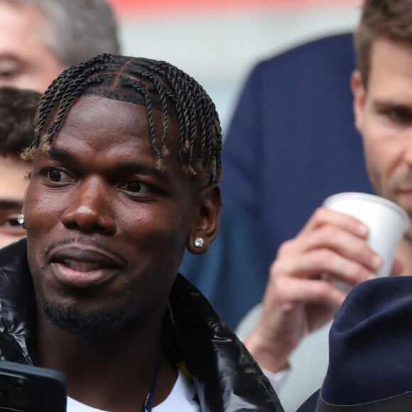 Paul Pogba et Lilian Thuram - Célébrités dans les tribunes du huitième de finale de l'Euro 2024 entre la France et la Belgique (1-0) à Dusseldorf le 1er juillet 2024.