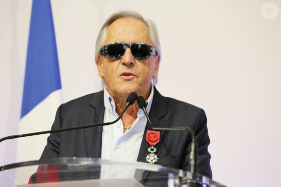 Cérémonie de remise des insignes d'officier de la Légion d'honneur à Gilbert Montagné en présence de Sophie Cluzel, secrétaire d'État chargée des Personnes handicapées à Paris le 23 septembre 2021