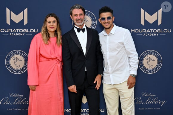 Marion Bartoli avec mari Yahya Boumediene et Patrick Mouratoglou - 10ème édition du Gala de Charité de Patrick Mouratoglou à l'Académie Mouratoglou à Biot Sophia Antipolis, le 23 juin 2024. Le Mouratoglou Annual Charity Gala est organisé chaque année pour lever des fonds au profit la Fondation Champ'Seed, créée par Patrick Mouratoglou en 2014 afin de soutenir les talents les plus prometteurs du tennis et les aider à atteindre le plus haut niveau international. Depuis son lancement, la Fondation de Patrick Mouratoglou a déjà permis de lever plus de 5 millions d'euros. Parmi les talents aidés par la fondation, on compte Stefanos Tsitsipas, Coco Gauff, vainqueur de l'US Open 2023, et Holger Rune, actuellement numéro 12 mondial à seulement 21 ans. © Bruno Bebert/Bestimage