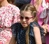 Si les motifs de leurs robes étaient différents, des détails semblables étaient à noter, comme les manches volantes et la fine ceinture qui venait entourer leur taille
Catherine (Kate) Middleton avec la princesse Charlotte et Pippa Middleton dans les tribunes de la finale du tournoi de Wimbledon 2024, le 14 juillet 2024.