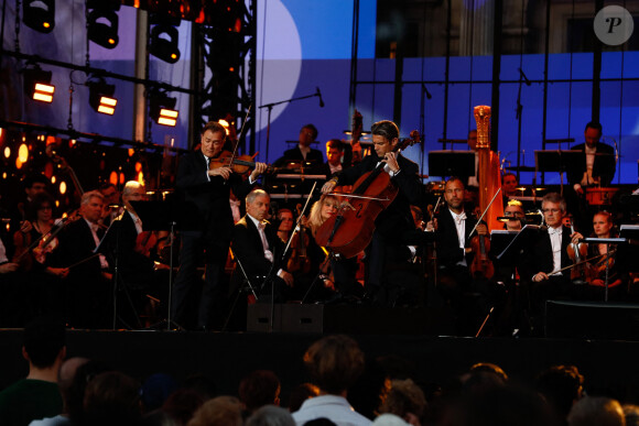 Renaud Capuçon, Gautier Capuçon - "Concert de Paris" sur le parvis de l'hôtel de ville de Paris retransmis en direct sur France 2 et sur France Inter, Paris le 14 juillet 2024. © Christophe Clovis - Pierre Perusseau / Bestimage 