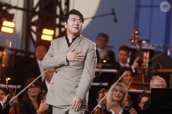 Lang Lang - "Concert de Paris" sur le parvis de l'hôtel de ville de Paris retransmis en direct sur France 2 et sur France Inter, Paris le 14 juillet 2024. © Christophe Clovis - Pierre Perusseau / Bestimage "Concert de Paris" on the forecourt of Paris City Hall broadcast live on France 2 and France Inter, Paris on July 14, 2024.