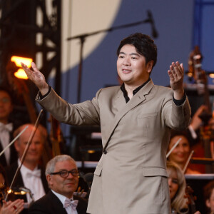 Lang Lang - "Concert de Paris" sur le parvis de l'hôtel de ville de Paris retransmis en direct sur France 2 et sur France Inter, Paris le 14 juillet 2024. © Christophe Clovis - Pierre Perusseau / Bestimage  "Concert de Paris" on the forecourt of Paris City Hall broadcast live on France 2 and France Inter, Paris on July 14, 2024. 