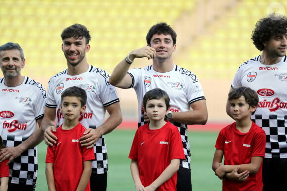 Pierre Gasly et Charles Leclerc - Match de charité de la 30ème édition du "World Stars Football" avec des pilotes de F1 et des stars du football au profit de l'association "Star Team For The Children" au stade Louis II à Monaco le 23 mai 2023. © Jean-François Ottonello/Bestimage