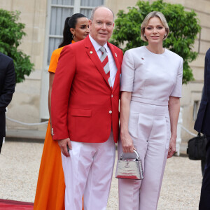 Le prince Albert II de Monaco et la princesse Charlène de Monaco - Emmanuel Macron, Président de la République Française, et la Première dame Brigitte Macron, accueillent les chefs d'Etat et de gouvernement présents à Paris pour la cérémonie d'ouverture des Jeux Olympiques de Paris 2024 (JO). © Dominique Jacovides- Pierre Perusseau /Bestimage 