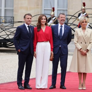 Le roi Frederik et la reine Mary de Danemark - Emmanuel Macron, Président de la République Française, et la Première dame Brigitte Macron, accueillent les chefs d'Etat et de gouvernement présents à Paris pour la cérémonie d'ouverture des Jeux Olympiques de Paris 2024 (JO).  © Dominique Jacovides- Pierre Perusseau /Bestimage 