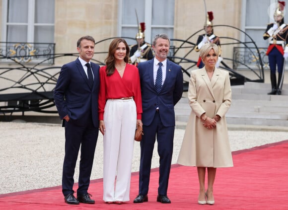 Le roi Frederik et la reine Mary de Danemark - Emmanuel Macron, Président de la République Française, et la Première dame Brigitte Macron, accueillent les chefs d'Etat et de gouvernement présents à Paris pour la cérémonie d'ouverture des Jeux Olympiques de Paris 2024 (JO).  © Dominique Jacovides- Pierre Perusseau /Bestimage 