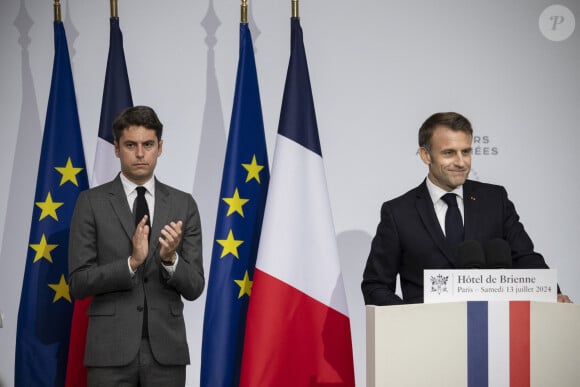 Le président de la République Emmanuel Macron et le Premier ministre Gabriel Attal lors de la réception à l'Hôtel De Brienne à Paris, en l'honneur des troupes du 14 juillet. Le 13 juillet 2024 © Eliot Blondet / Pool / Bestimage 