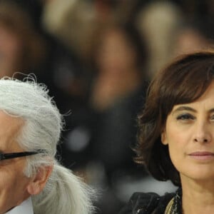 Baptiste Giabiconi, Karl Lagerfeld et Inès de La Fressange lors de la présentation de la collection de prêt-à-porter printemps-été 2011 de Chanel au Grand Palais à Paris, le 5 octobre 2010. Thierry Orban/ABACAPRESS.COM