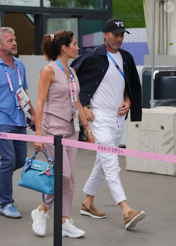 Paris, France - Zinedine Zidane, entraîneur de football et ancien footballeur, et sa femme Véronique assistent à la finale de gymnastique artistique féminine à l'arène de Bercy lors des Jeux olympiques de Paris 2024. Sur la photo : Zinedine Zidane, Véronique Zidane