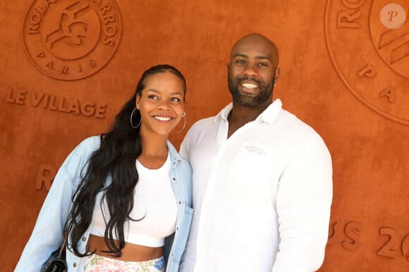 
Teddy Riner et sa femme Luthna Plocus au village lors des internationaux de France Roland Garros à Paris le 13 juin 2021. © Dominique Jacovides / Bestimage