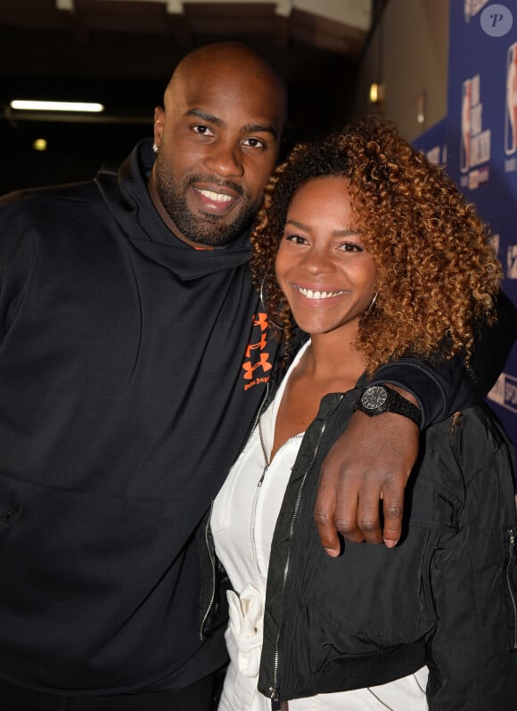 Teddy Riner et sa compagne Luthna Plocus au match de NBA Game Paris 2020 entre les Bucks de Milwaukee et les Charlotte Hornet à l'AccorHotels Arena à Paris le 24 janvier 2020. © Veeren / Bestimage