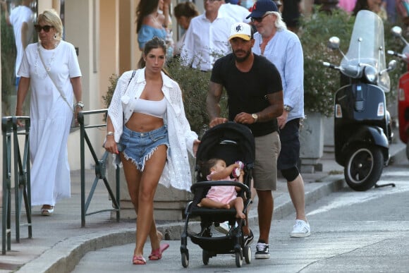 Exclusif - Liam Di Benedetto, sa fille Joy et son compagnon Christophe Dicranian se promènent dans les rues de Saint-Tropez. Le 22 juillet 2020