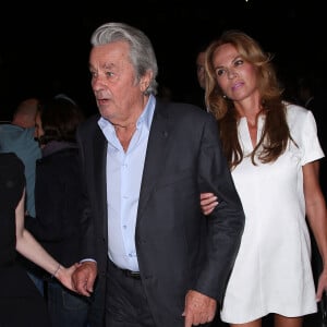 Rosalie Van Breemen, ex-compagne d'Alain Delon et mère d'Alain-Fabien a diffusé des images le lendemain du dernier voyage de l'acteur.
Alain Delon Rosalie Van Breemen - People au defile de mode Elie Saab - Collection pret-a-porter printemps-ete 2013 - paris le 03/10/2012 