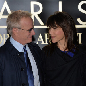 Christophe Lambert séparé de Sophie Marceau 
Sophie Marceau et son compagnon Christophe Lambert - Arrivee des people au defile Giorgio Armani au Palais de Tokyo a Paris. 