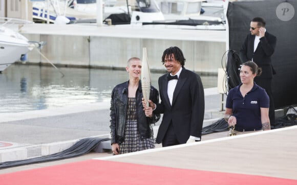 Exclusif - Marie Patouillet, Arnaud Assoumani et la flamme olympique - Plateau de l'émission "C à vous" lors du 77ème Festival International du Film de Cannes le 21 mai 2024. © Jack Tribeca/Bestimage