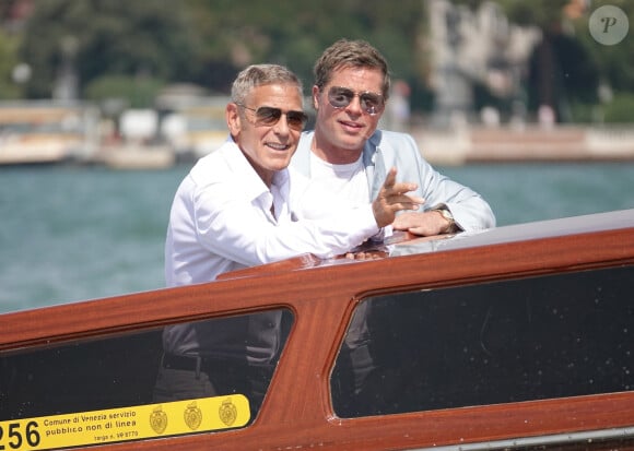 Venise, ITALIE - Les stars hollywoodiennes Brad Pitt et George Clooney prennent un bateau-taxi de l'hôtel Cipriani pour se rendre au festival du film de Venise sur le Lido.