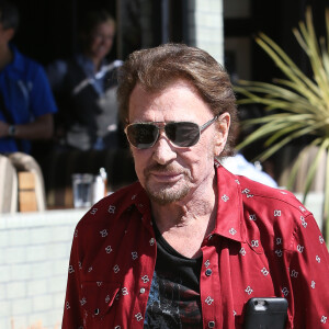 Johnny Hallyday avec sa femme Laeticia, leurs filles Jade et Joy, Marie Poniatowski avec son mari Pierre Rambaldi et leur fille Tess, à Santa Monica, le 1er avril 2017.