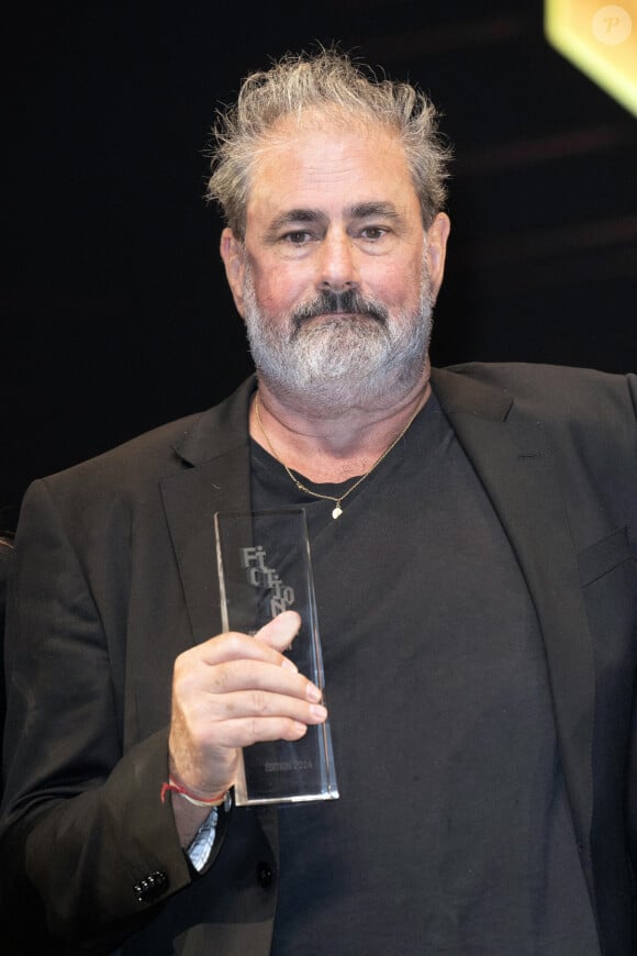 Gustave Kervern receives the Best Director award for the series Je ne me laisserai plus faire during the 26th La Rochelle Fiction Festival on 15 September 2024 in La Rochelle, France. Photo by David NIVIERE/ABACAPRESS.COM 