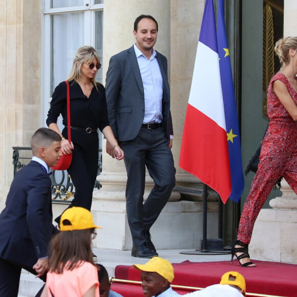 Tiphaine Auzière (fille de B. Macron) et guest - Le président de la République Française Emmanuel Macron et la Première dame Brigitte Macron, accueillent les joueurs de l'équipe de France (Les Bleus) et son sélectionneur Didier Deschamps, le président de la Fédération Française de Football Noël Le Graët et des membres de la FFF, au Palais de l'Elysée. L'équipe de France est en provenance directe de Russie où elle a été sacrée Championne du Monde 2018, pour la deuxième fois de son histoire, après sa victoire en finale face à la Croatie (4-2). Paris, le 16 juillet 2018. © Stéphane Lemouton/Bestimage 