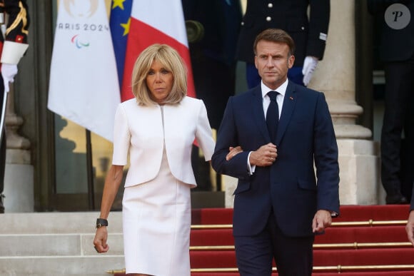 Brigitte Macron, Emmanuel Macron - Réception des chefs d'état, de gouvernement et d'organisation internationale en amont de la cérémonie d'ouverture des jeux paralympiques de Paris 2024 au palais de l'Elysée à Paris, France, le 28 août 2024. © Christophe Clovis / Bestimage 