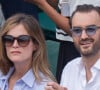 De nature discrète, la maman de Léo avait été aperçue avec Cyril Lignac à Roland Garros...
Cyril Lignac et sa compagne Marine en tribune lors des Internationaux de France de tennis à la salle Roland-Garros le 10 juin 2018 à Paris, France. Photo par Nasser Berzane/ABACAPRESS.COM