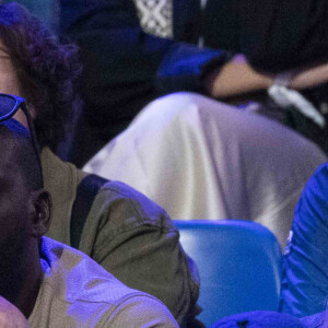 Ladji Doucouré et sa compagne - Célébrités assistent à la finale de l'épée individuelle homme avec le francais Yannick Borel qui perd en finale face à Kōki Kanō au Grand Palais lors des Jeux Olympiques de Paris 2024 (JO) à Paris le 28 juillet 2024. © Dominique Jacovides-Pierre Perusseau/Bestimage