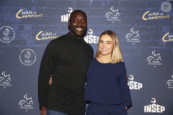 Ladji Doucouré avec Inès Vandamme - Soirée des Champions à l'INSEP à Paris le 10 décembre 2019. © Gwendoline Le Goff/Panoramic/Bestimage