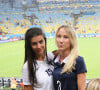 Pour créer leur société, les deux femmes auraient investi une modeste somme, 500 euros chacune, sur des papiers officiels dévoilés par le Parisien.
Ludivine Sagna et Sandra Evra - Les femmes des joueurs de l'équipe de France assistent au match France - Equateur à Rio de Janeiro au Brésil le 25 juin 2014. 