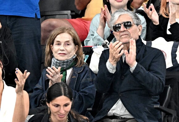 Isabelle Huppert et Ronald Chammah pendant les JO 2024