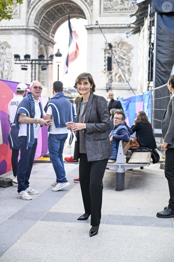 Exclusif - Amélie Oudéa-Castéra - Remise des médailles par le président de la République à l'Arc de Triomphe aux athlètes lors de la parade des champions à l'occasion des Jeux Olympiques et Paralympiques Paris 2024, sur l'avenue des Champs-Elysées à Paris. Le 14 septembre 2024 © Perusseau-Ramsamy / Bestimage