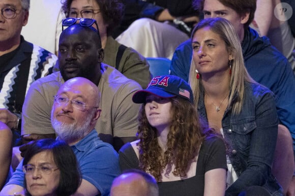 Ladji Doucouré et sa compagne - Célébrités assistent à la finale de l'épée individuelle homme avec le francais Yannick Borel qui perd en finale face à Kōki Kanō au Grand Palais lors des Jeux Olympiques de Paris 2024 (JO) à Paris le 28 juillet 2024. © Dominique Jacovides-Pierre Perusseau/Bestimage