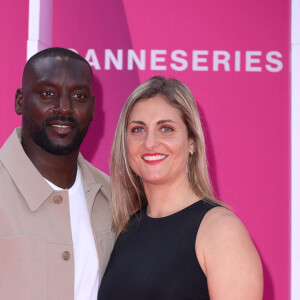 Ladji Doucouré avec sa compagne - Soirée d'ouverture de la 7ème saison de "CanneSeries" à Cannes le 5 avril 2024. © Denis Guignebourg/Bestimage