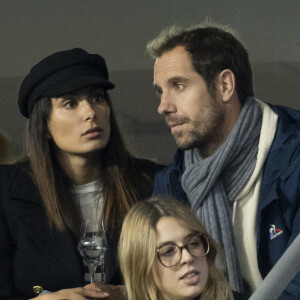 Richard Gasquet et sa compagne Clementine dans les tribunes lors de la demi-finale de la Coupe du Monde de Rugby opposant l'Argentine à la Nouvelle Zélande (6 - 44) au Stade de France à Saint-Denis, France, le 20 octobre 2023. © Cyril Moreau/Bestimage