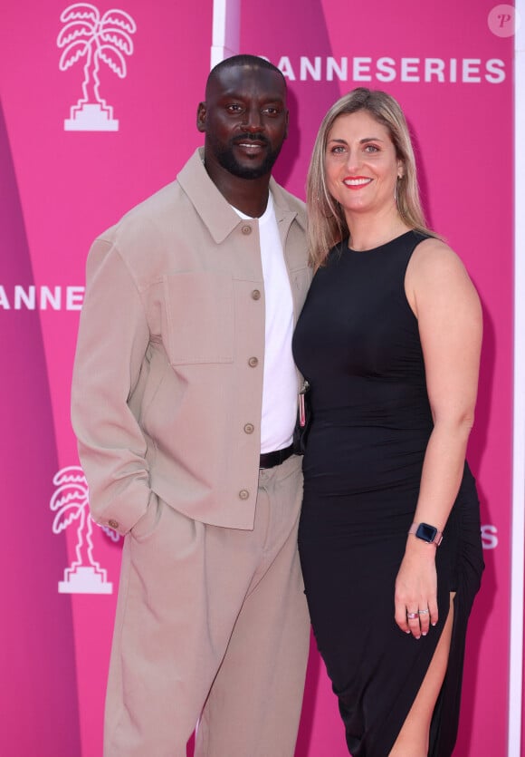 Ladji Doucouré avec sa compagne - Soirée d'ouverture de la 7ème saison de "CanneSeries" à Cannes le 5 avril 2024. © Denis Guignebourg/Bestimage