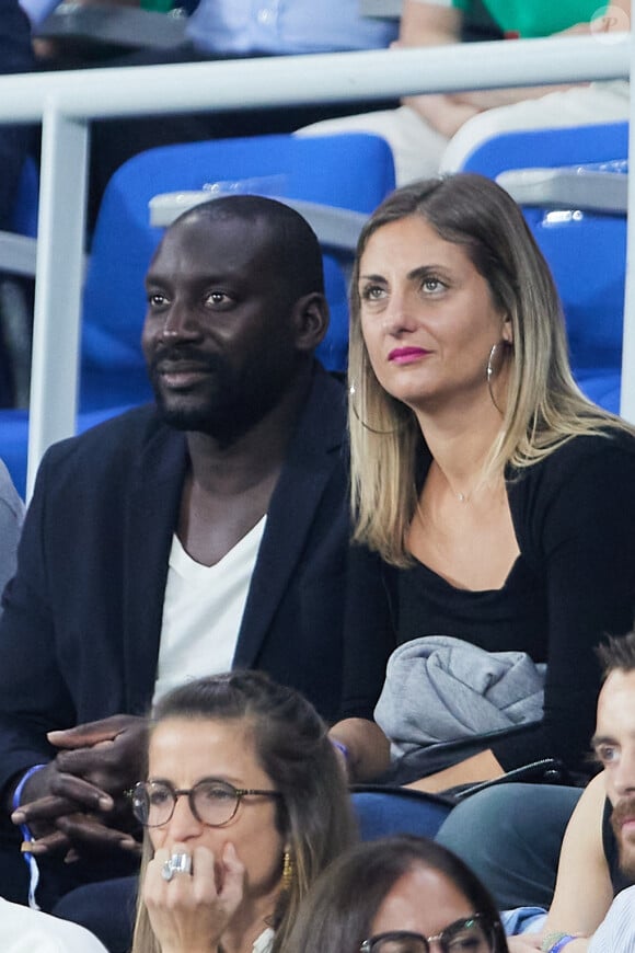 Ladji Doucouré avec sa compagne dans les tribunes du match de Coupe du monde de rugby opposant l'Irlande à l'Ecosse (36-14) au stade de France à Saint-Denis, proche Paris, Seine Saint-Denis, France, le 7 octobre 2023. © Jacovides-Moreau/Bestimage