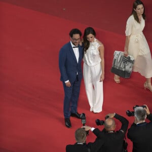 Ce lundi 14 octobre
Thomas Hollande, sa femme Emilie Broussouloux - Montée des marches du film "R.M.N." lors du 75ème Festival International du Film de Cannes, le 21 mai 2022. © Pool/ Bestimage 