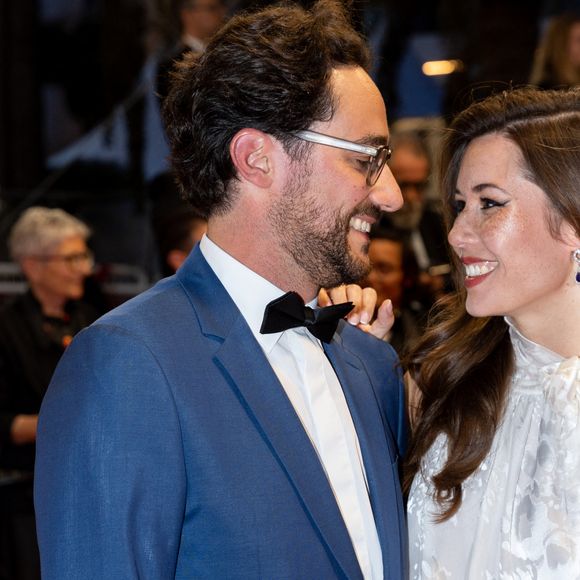 Thomas Hollande, sa femme Emilie Broussouloux - Montée des marches du film "R.M.N." lors du 75ème Festival International du Film de Cannes, le 21 mai 2022. © Cyril Moreau / Bestimage 