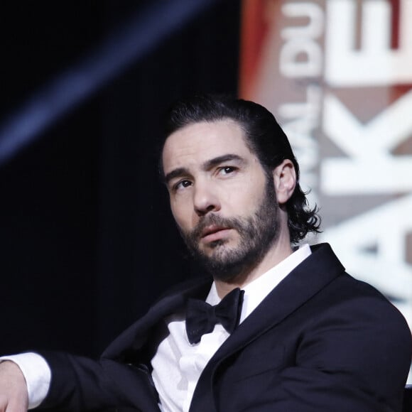 "Pour l'instant, ils ne savent pas ce que l'ont fait", a affirmé le comédienne dans les colonnes de l'hebdomadaire.
Tahar Rahim lors de la cérémonie de clôture de la 19ème édition du Festival International du Film de Marrakech (FIFM) au Palais des Congrès à Marrakech, le 19 novembre 2022. © Denis Guignebourg/Bestimage 