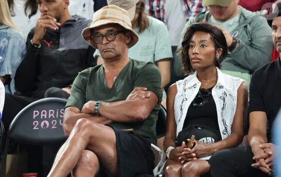 Yannick Noah et sa compagne Malika - Les célébrités en tribunes pendant l'épreuve de basketball de Demi-Finale opposant la France à l'Allemagne lors des Jeux Olympiques de Paris 2024 (JO) à l'Arena Bercy, à Paris, France, le 8 août 2024. © Jacovides-Perusseau/Bestimage