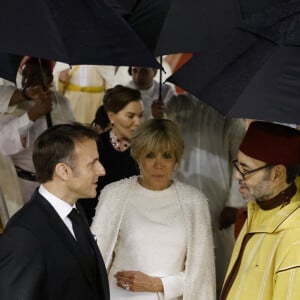 Brigitte Macron et Emmanuel Macron lors du banquet d'Etat organisé par le roi Mohammed VI en leur honneur à Rabat au Maroc, le 29 octobre 2024. © Ludovic Marin/Pool/Bestimage