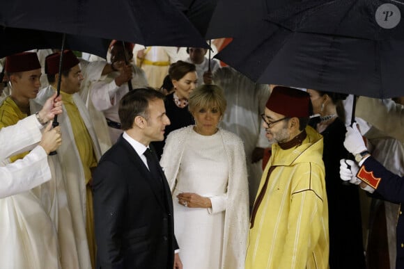 Brigitte Macron et Emmanuel Macron lors du banquet d'Etat organisé par le roi Mohammed VI en leur honneur à Rabat au Maroc, le 29 octobre 2024. © Ludovic Marin/Pool/Bestimage