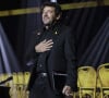 "Herby...Herby Moreau... Je ne peux croire que j'écris ces mots... Tu as été là depuis le début, depuis mon tout premier jour à Montréal...", a-t-il d'abord écrit. 
Patrick Bruel lors d'une cérémonie organisée par le Conseil des institutions juives de France (CRIF) en hommage aux victimes des attentats du Hamas du 7 octobre 2023 contre Israël, à l'occasion du premier anniversaire de l'événement, à Paris, le 7 octobre 2024. © Jack Tribeca / Bestimage 