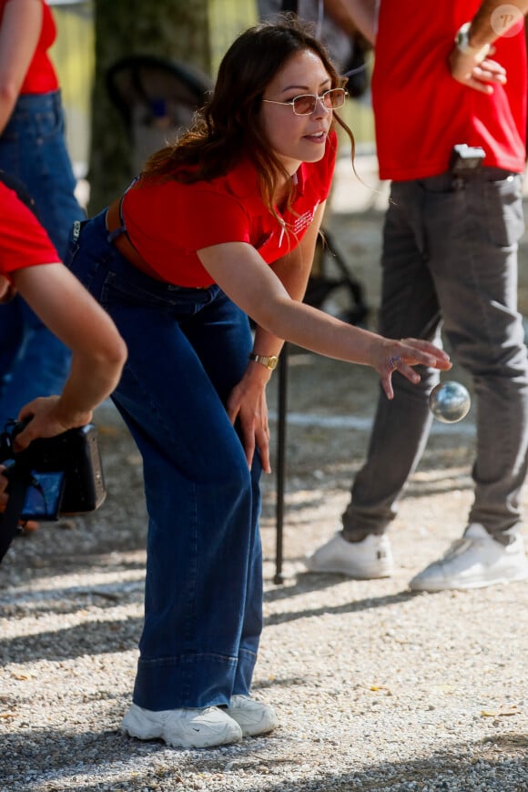 Exclusif - Dounia Coesens - Pétanque du coeur dans le cadre le la 20ème édition de "l'étape du coeur" de l'association "Mécénat Chirurgie Cardiaque" (MCC) lors du tour de France 2023 au Fan Club de Bordeaux, France, le 06 juillet 2023. © Christophe Clovis / Bestimage 